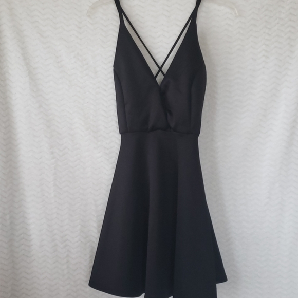 Charlotte Russe Dresses & Skirts - Charlotte Russe  Sexy black mini dress.